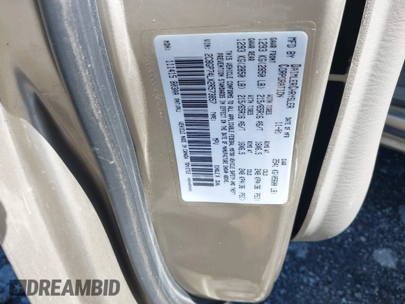 2002 Chrysler Town & Country EX with VIN 2C8GP74LX2R573857, listed as a IAAI auction lot 41846302 with Not Provided miles and . Bid and sale history available at carsss.com. Image 9.