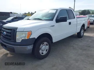 2009 Ford F-150 STX with VIN 1FTRX12W49FA84442, listed as a IAAI auction lot 41824315 with 143,529 mi miles. Bid and sale history available at carsss.com. Image 2.