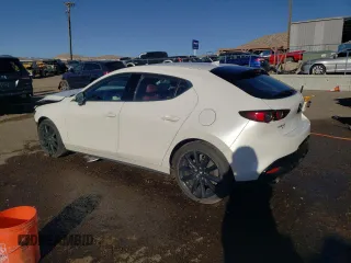 2020 Mazda Mazda3 Hatchback Premium Package with VIN JM1BPBNM9L1158444, listed as a Copart auction lot 49339575 with 93,329 mi miles and Salvage Title. Bid and sale history available at carsss.com. Image 2.