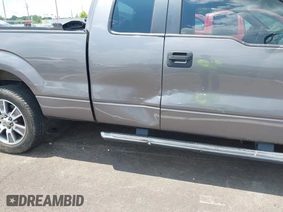 2014 Ford F-150 XL with VIN 1FTEX1CM4EKF42963, listed as a IAAI auction lot 42593646 with 143,409 mi miles and . Bid and sale history available at DreamBid. Image 18.