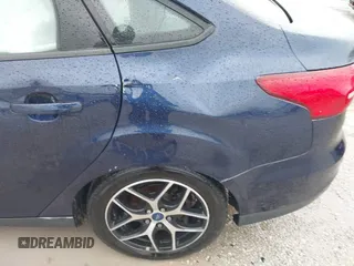 2017 Ford Focus SEL with VIN 1FADP3H29HL312631, listed as a IAAI auction lot 41226591 with 133,814 mi miles. Bid and sale history available at carsss.com. Image 22.