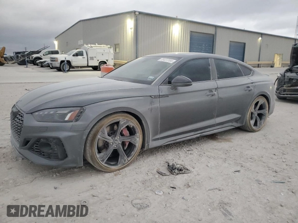 2023 Audi RS 5 Sportback z VIN WUAAWCF54PA901323, wystawiony jako Copart lot #78427704 z przebiegiem 21 901 mil mil oraz Szkoda całkowita • Salvage title. Historia ofert i sprzedaży dostępna na DreamBid. Obrazek 1.