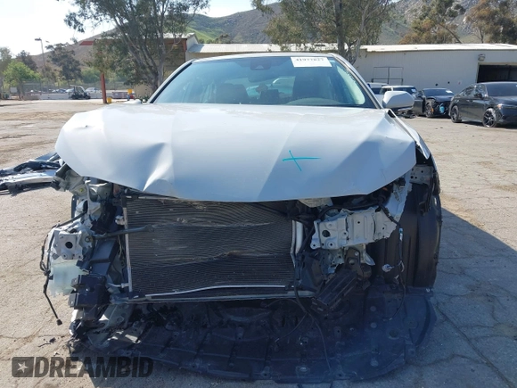 2023 Toyota Camry SE with VIN 4T1T11AK8PU138805, listed as a IAAI auction lot 41977827 with 19,661 mi miles and . Bid and sale history available at DreamBid. Image 13.