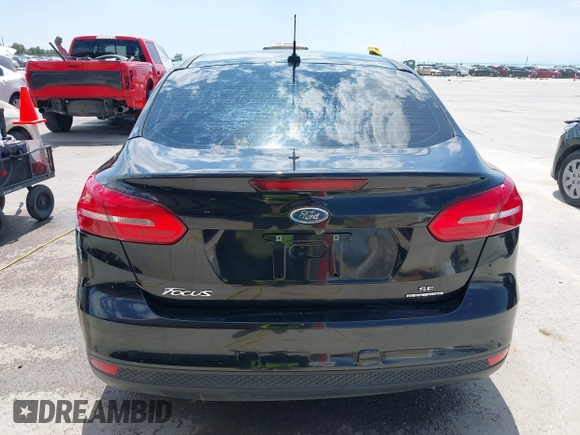 2015 Ford Focus SE with VIN 1FADP3F2XFL313657, listed as a IAAI auction lot 42205474 with 161,353 mi miles and . Bid and sale history available at DreamBid. Image 16.
