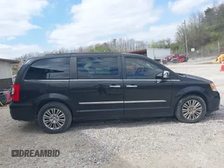 2015 Chrysler Town & Country Touring L with VIN 2C4RC1CG8FR522404, listed as a IAAI auction lot 41932426 with 165,092 mi miles and . Bid and sale history available at DreamBid. Image 13.