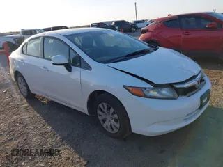 2012 Honda Civic LX z VIN 19XFB2F54CE054609, wystawiony jako IAAI lot #41839528 z przebiegiem 121 443 mil mil oraz . Historia ofert i sprzedaży dostępna na DreamBid. Obrazek 1.