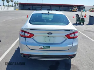 2014 Ford Fusion Titanium with VIN 3FA6P0K96ER248025, listed as a IAAI auction lot 42189061 with 64,351 mi miles and . Bid and sale history available at DreamBid. Image 17.