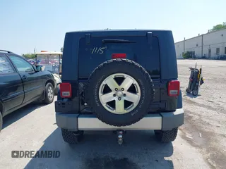 2009 Jeep Wrangler Sahara with VIN 1J4FA541X9L763737, listed as a IAAI auction lot 42721115 with 166,663 mi miles and . Bid and sale history available at DreamBid. Image 16.