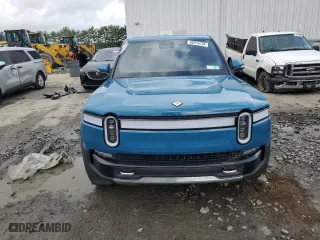 2023 Rivian R1T Adventure with VIN 7FCTGBAA5PN026063, listed as a Copart auction lot 66916194 with 0 mi miles and Salvage Title. Bid and sale history available at carsss.com. Image 5.