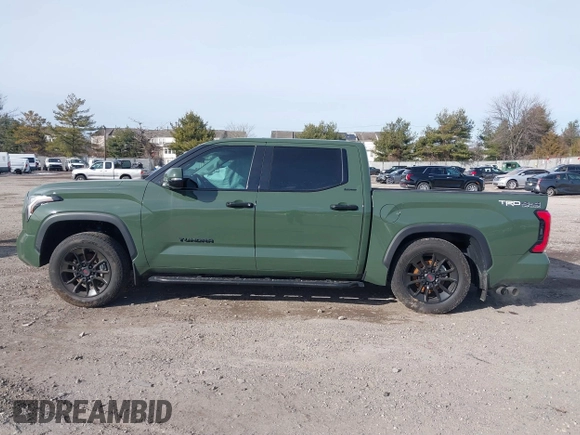 2023 Toyota Tundra Limited with VIN 5TFJA5DBXPX081603, listed as a IAAI auction lot 41293156 with 15,155 mi miles and . Bid and sale history available at DreamBid. Image 14.