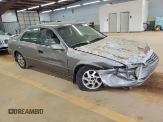 1998 Toyota Camry LE с VIN 4T1BG22K6WU356495, выставлен на аукционе Copart как лот 55639765 с пробегом Не указан миль и Списание • Salvage title. История ставок и продаж доступна на DreamBid. Изображение 4.