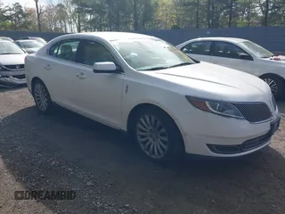 2014 Lincoln MKS with VIN 1LNHL9DK7EG609994, listed as a IAAI auction lot 42162778 with 239,807 mi miles and . Bid and sale history available at DreamBid. Image 1.