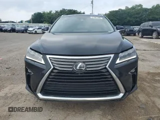 2017 Lexus RX 350 with VIN 2T2BZMCA9HC129460, listed as a Copart auction lot 57301995 with 163,128 mi miles and Salvage title. Bid and sale history available at DreamBid. Image 5.