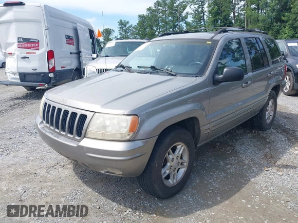 1999 Jeep Grand Cherokee Limited with VIN 1J4GW68N9XC808639, listed as a IAAI auction lot 42521785 with 156,864 mi miles and . Bid and sale history available at DreamBid. Image 2.