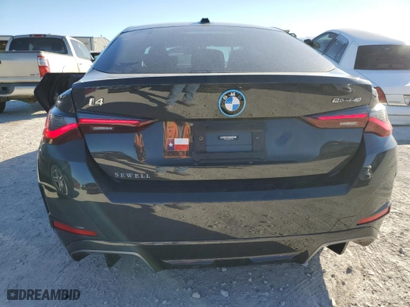 2023 BMW i4 eDrive40 with VIN WBY73AW09PFN91308, listed as a Copart auction lot 77179493 with 4,301 mi miles. Bid and sale history available at carsss.com. Image 6.