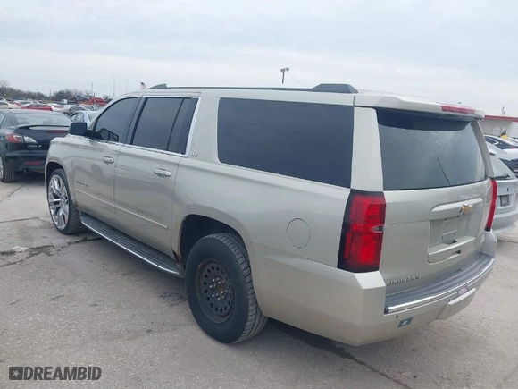 2015 Chevrolet Suburban LTZ with VIN 1GNSKKKC0FR525772, listed as a IAAI auction lot 41745084 with 187,981 mi miles. Bid and sale history available at carsss.com. Image 3.