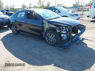 2023 Kia Forte GT-Line z VIN 3KPF54ADXPE686117, wystawiony jako IAAI lot #41996504 z przebiegiem 20 441 mil mil oraz . Historia ofert i sprzedaży dostępna na DreamBid. Obrazek 1.