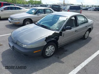 1997 Saturn SL z VIN 1G8ZH5285VZ117635, wystawiony jako IAAI lot #42153929 z przebiegiem 193 224 mil mil oraz . Historia ofert i sprzedaży dostępna na DreamBid. Obrazek 2.