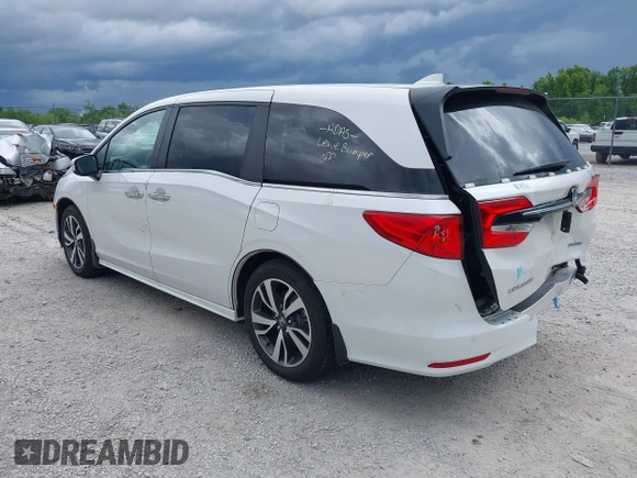 2023 Honda Odyssey Touring with VIN 5FNRL6H88PB079716, listed as a IAAI auction lot 42208628 with 26,679 mi miles and . Bid and sale history available at DreamBid. Image 3.