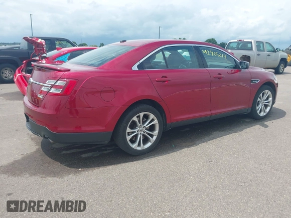 2014 Ford Taurus SHO with VIN 1FAHP2KT1EG133940, listed as a IAAI auction lot 42805214 with 141,204 mi miles and . Bid and sale history available at DreamBid. Image 4.