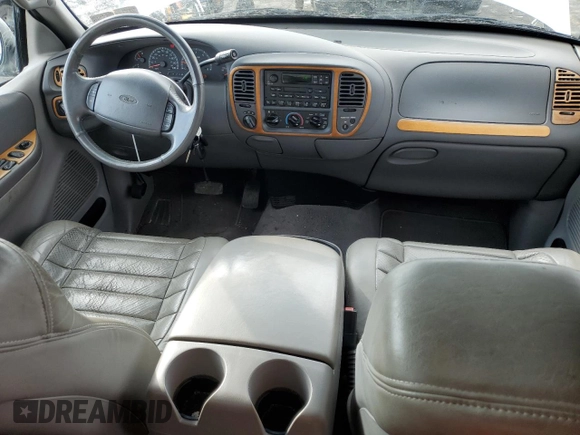 2002 Ford F-150 XL z VIN 2FTRX08L12CA26636, wystawiony jako Copart lot #89254825 z przebiegiem 133 637 mil mil oraz Szkoda całkowita • Salvage title. Historia ofert i sprzedaży dostępna na DreamBid. Obrazek 8.