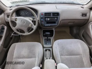 2000 Honda Civic LX with VIN 2HGEJ6676YH512977, listed as a Copart auction lot 50985455 with 242,759 mi miles and Salvage Title. Bid and sale history available at DreamBid. Image 8.