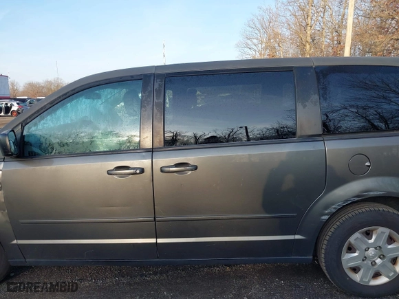 2010 Dodge Grand Caravan SE with VIN 2D4RN4DE7AR397092, listed as a IAAI auction lot 41084684 with 117,747 mi miles. Bid and sale history available at carsss.com. Image 14.