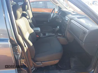 2004 Jeep Grand Cherokee Laredo z VIN 1J4GW48S24C159370, wystawiony jako IAAI lot #41296094 z przebiegiem 138 296 mil mil oraz . Historia ofert i sprzedaży dostępna na DreamBid. Obrazek 5.