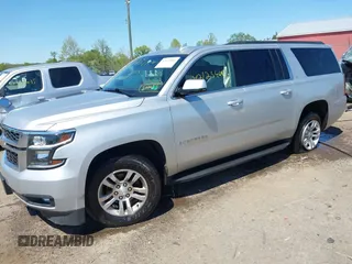2017 Chevrolet Suburban LT z VIN 1GNSKHKC9HR268651, wystawiony jako IAAI lot #42125406 z przebiegiem 174 451 mil mil oraz . Historia ofert i sprzedaży dostępna na DreamBid. Obrazek 2.