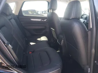 2025 Mazda CX-5 2.5 S Premium Plus Package with VIN JM3KFBEM6S0546892, listed as a Copart auction lot 49217495 with 1,144 mi miles and Salvage Title. Bid and sale history available at carsss.com. Image 12.