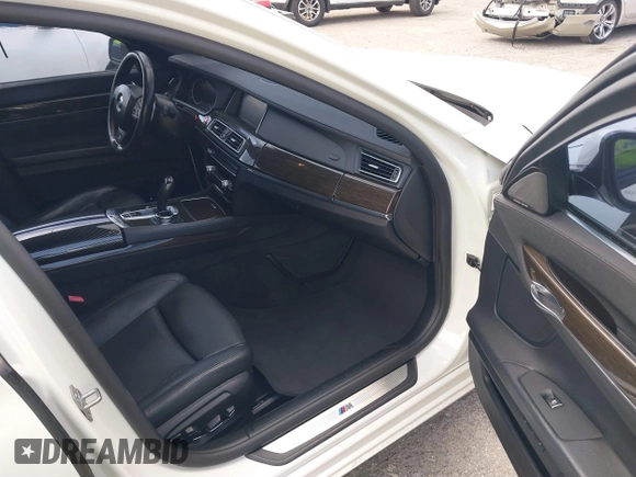 2014 BMW 7 Series 740i with VIN WBAYA6C53ED144195, listed as a IAAI auction lot 41720500 with 123,776 mi miles and . Bid and sale history available at DreamBid. Image 5.