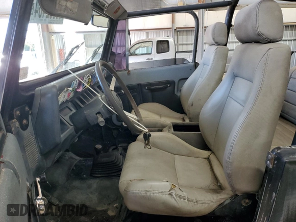 1994 Jeep Wrangler S with VIN 1J4FY19P0RP413690, listed as a Copart auction lot 85532464 with 164,148 mi miles and Salvage Title. Bid and sale history available at carsss.com. Image 7.