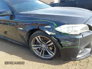 2013 BMW 5 Series 535i xDrive with VIN WBAFU7C50DDU77411, listed as a IAAI auction lot 41796299 with 138,944 mi miles and . Bid and sale history available at carsss.com. Image 6.