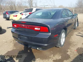 2014 Dodge Charger SE with VIN 2C3CDXBG7EH147959, listed as a IAAI auction lot 41773645 with 142,231 mi miles and . Bid and sale history available at carsss.com. Image 4.
