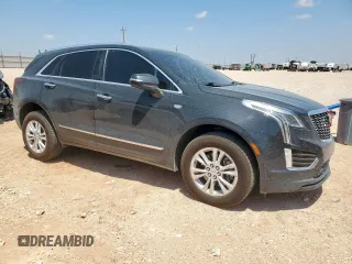 2020 Cadillac XT5 Luxury FWD z VIN 1GYKNAR47LZ173823, wystawiony jako Copart lot #56770025 z przebiegiem 74 192 mil mil oraz Szkoda całkowita • Salvage title. Historia ofert i sprzedaży dostępna na DreamBid. Obrazek 4.