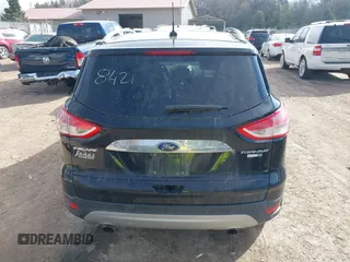 2016 Ford Escape Titanium with VIN 1FMCU9JX4GUB38303, listed as a IAAI auction lot 41788421 with 138,511 mi miles and . Bid and sale history available at DreamBid. Image 17.