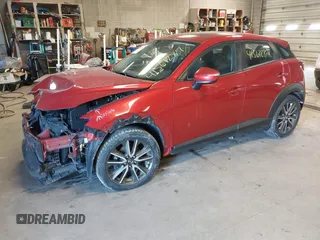 2017 Mazda CX-3 Touring with VIN JM1DKFC73H0175023, listed as a IAAI auction lot 41561287 with 110,669 mi miles. Bid and sale history available at carsss.com. Image 2.
