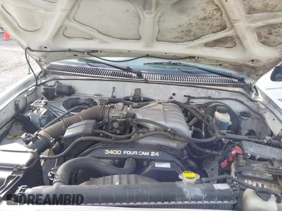 2004 Toyota Tacoma z VIN 5TEWN72N54Z463111, wystawiony jako IAAI lot #42093928 z przebiegiem 147 136 mil mil oraz . Historia ofert i sprzedaży dostępna na DreamBid. Obrazek 10.