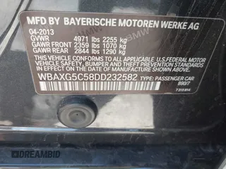 2013 BMW 5 Series 528i with VIN WBAXG5C58DD232582, listed as a IAAI auction lot 41890082 with 150,401 mi miles and . Bid and sale history available at carsss.com. Image 9.