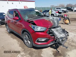 2017 Hyundai Santa Fe 2.4L z VIN 5XYZU3LB8HG434067, wystawiony jako IAAI lot #41792700 z przebiegiem Nie podano mil oraz . Historia ofert i sprzedaży dostępna na DreamBid. Obrazek 1.