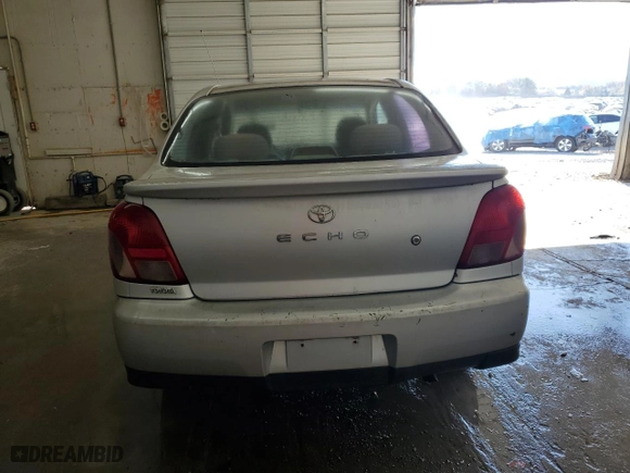 2001 Toyota ECHO with VIN JTDBT123110105869, listed as a Copart auction lot 79242824 with 194,146 mi miles and Salvage Title. Bid and sale history available at carsss.com. Image 6.