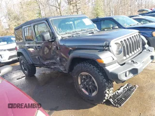 2022 Jeep Wrangler Unlimited Sport with VIN 1C4HJXDN1NW240032, listed as a IAAI auction lot 41130845 with 24,745 mi miles and . Bid and sale history available at DreamBid. Image 1.