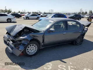 1999 Nissan Maxima GXE z VIN JN1CA21D9XM409448, wystawiony jako Copart lot #51822895 z przebiegiem Nie podano mil oraz Szkoda całkowita • Salvage title. Historia ofert i sprzedaży dostępna na DreamBid. Obrazek 1.