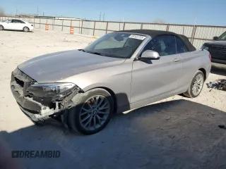 2015 BMW 2 Series 228i with VIN WBA1K5C54FV242897, listed as a Copart auction lot 89165755 with 37,100 mi miles and Salvage Title. Bid and sale history available at carsss.com. Image 1.
