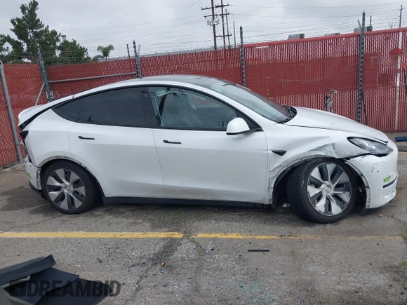 2023 Tesla Model Y Long Range with VIN 7SAYGAEE9PF702910, listed as a IAAI auction lot 42199519 with 91,094 mi miles and . Bid and sale history available at DreamBid. Image 13.