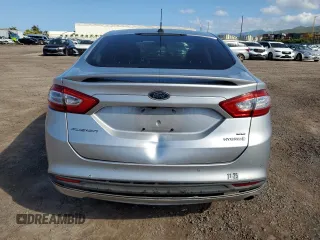 2013 Ford Fusion SE Hybrid z VIN 3FA6P0LU8DR325849, wystawiony jako Copart lot #53520515 z przebiegiem 93 615 mil mil oraz Czysty tytuł • Clean title. Historia ofert i sprzedaży dostępna na DreamBid. Obrazek 6.
