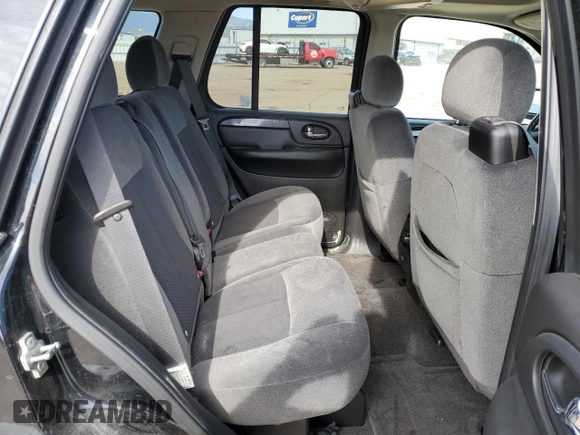 2007 GMC Envoy SLE z VIN 1GKDT13SX72284705, wystawiony jako Copart lot #53304425 z przebiegiem 103 203 mil mil oraz Czysty tytuł • Clean title. Historia ofert i sprzedaży dostępna na DreamBid. Obrazek 11.