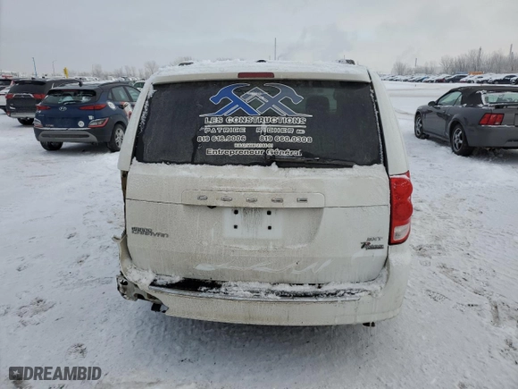 2019 Dodge Grand Caravan SE with VIN 2C4RDGBG6KR727697, listed as a Copart auction lot 85964494 with 115,541 mi miles and Salvage Title. Bid and sale history available at carsss.com. Image 6.