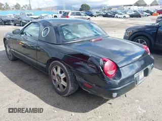2004 Ford Thunderbird Deluxe with VIN 1FAHP60A64Y101843, listed as a IAAI auction lot 41582696 with 146,492 mi miles and . Bid and sale history available at DreamBid. Image 3.