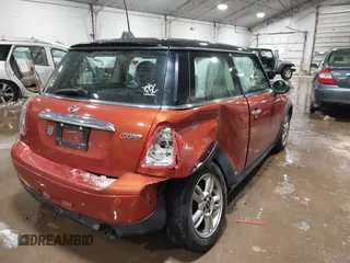 2012 MINI Hardtop with VIN WMWSU3C59CT260953, listed as a IAAI auction lot 41228571 with 138,313 mi miles and . Bid and sale history available at DreamBid. Image 4.
